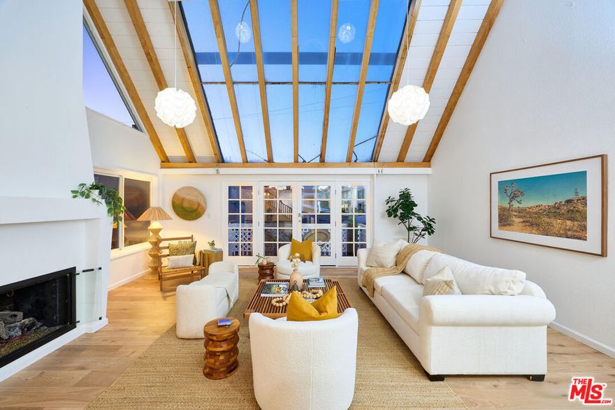 Elegant Top-Floor Residence on the Marina Peninsula! Experience coastal living at its finest in this stunning 3-bedroom, 3-bathroom top-floor home on the coveted Marina Peninsula. Updated with elegant, clean finishes throughout, this residence combines modern style with the ultimate beachside lifestyle. The open living room and kitchen are framed by soaring high ceilings and natural light, flowing seamlessly to a private balcony perfect for enjoying ocean breezes. The gourmet kitchen features sleek finishes and effortless connection to the main living area, creating an ideal space for entertaining or everyday comfort. A private roof deck crowns the home, showcasing panoramic ocean views. You can watch sailing races and boats entering the marina, just moments from the sand, this retreat offers both serenity and vibrancy enjoy morning walks along the beach, or stroll to nearby restaurants and coffee shops on Washington Boulevard. With three spacious bedrooms and three well-appointed bathrooms, this residence provides the perfect blend of comfort, luxury, and location. Whether hosting on the roof deck at sunset or enjoying the calm of your light-filled living room, this home captures the very best of Marina del Rey living.
