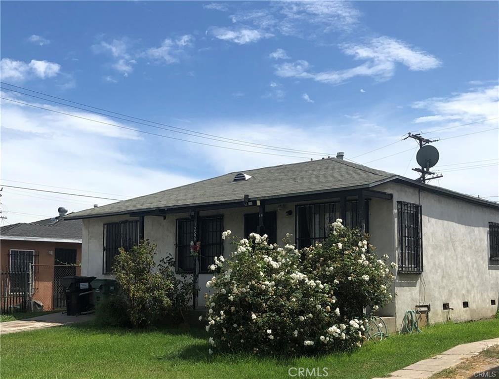 Triplex Opportunity. Seller paid for permits and architectural plans for 3 units. Rear house is now legally two units. Both are two-bedroom one bath each. The front unit is a separate 2-bedroom house. Front unit is tenant-occupied. Realtors, bring your 203k buyers and buy a triplex that is mostly vacant.Rear structure also has a separate storage area that is large enough for a laundry area. Rear building has gated parking. Please note that expenses are not included since owner has no history of expenses for new units.