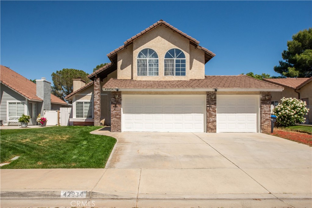 Move-In Ready West Lancaster Home with 3-Car Garage, RV Access, Solar, Water Filtration & EV Charging Welcome to this well-maintained 3-bedroom, 2.5-bath home offering 1,615 square feet of comfortable living space in a highly desirable West Lancaster neighborhood. With a rare 3-car garage, RV access, and thoughtful upgrades throughout, this home delivers value and versatility. Step inside to a light-filled living room featuring vaulted ceilings, a gorgeous rock fireplace, and tile flooring throughout the main level—creating a clean, open, and welcoming vibe. The kitchen offers ample cabinet space and a garden window that looks out onto the spacious backyard—perfect for home cooking and casual entertaining. Upstairs, the primary suite includes a large walk-in closet and an en-suite bath with double vanities. Two additional bedrooms and a full bathroom offer plenty of flexibility for guests, family, or a home office. The oversized backyard features block wall fencing, a covered patio, and tons of potential—whether you’re dreaming of a pool, garden, or just a peaceful retreat. Key upgrades include: Newer solar system for energy efficiency Whole house water filtration system for cleaner living 220V outlet in the garage for electric vehicle charging All centrally located near shopping, top-rated schools, and just minutes from freeway access.