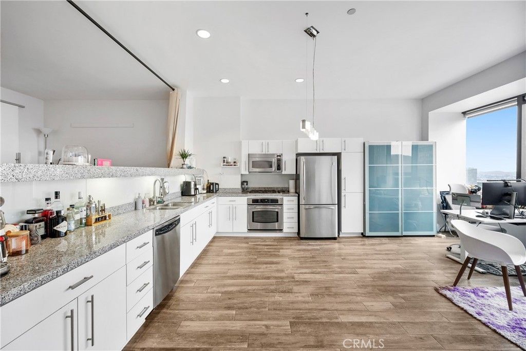 Photo of 1100 Wilshire Boulevard #2607, Los Angeles, CA 90017 (MLS # OC25132787)