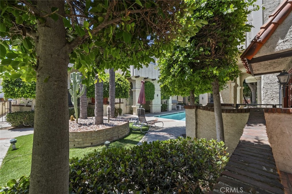 Welcome to this beautifully updated and move-in ready townhome with its own attached garage in the heart of Glendale. This unit is for sale for the first time in last 25 years! This spacious 2-bedroom, 3-bathroom home features hardwood flooring throughout, a fully remodeled kitchen with modern cabinetry and sleek finishes, and an upgraded primary suite with a refreshed bathroom. The split-level layout offers excellent separation of space, natural light, low HOA and privacy. Located in a well-maintained gated community with a sparkling pool, this home is perfect for anyone seeking comfort and convenience. Just a short stroll to the Glendale Galleria, The Americana at Brand, and Glendale Fashion Center, enjoy shopping, dining, and entertainment all within walking distance. Easy access to major freeways and top-rated schools. This charming condo is truly turnkey perfect for first-time buyers, downsizers, or investors. Don't miss this opportunity to own a stylish and low-maintenance home in one of Glendale's most desirable neighborhoods!