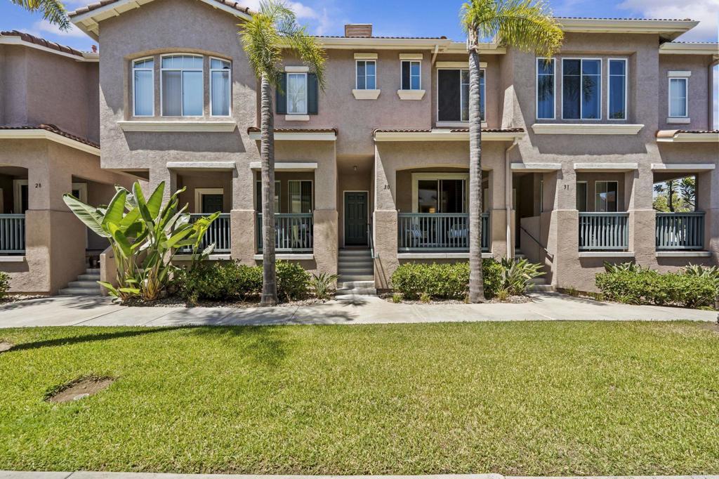 Welcome to this spacious townhome in the Mission Gate community in the heart of Mission Valley! The main level features hardwood floors, a private balcony, a gas fireplace, dining area, and an open-concept kitchen with granite counters and a large pantry—ideal for both everyday living and entertaining. A convenient half bath is also located on the main level. Upstairs, the generous primary suite offers a walk-in closet, an ensuite bathroom with a dual-sink vanity, and a soaking tub with a shower. The secondary bedroom includes its own en-suite bathroom with a tub/shower combo, perfect for guests or roommates. The attached two-car tandem garage includes built-in storage, a utility sink, and a washer and dryer for everyday convenience. This desirable gated community includes a sparkling pool and spa, and beautifully maintained landscaping with stone paver streets and a LOW HOA fee! Take advantage of the prime location just minutes from grocery stores, restaurants, and shopping at Mission Valley or Fashion Valley Malls. Conveniently located near the trolley station for quick trips to Petco Park, Snapdragon Stadium, SDSU, and more. Enjoy easy access to walking trails along the San Diego River, nearby parks, major freeways, and just minutes to the beaches, Downtown, or the airport.