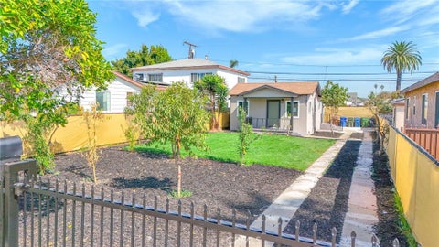 Photo of 1433 W 96th ST, Los Angeles, CA 90047 (MLS # DW26189027)