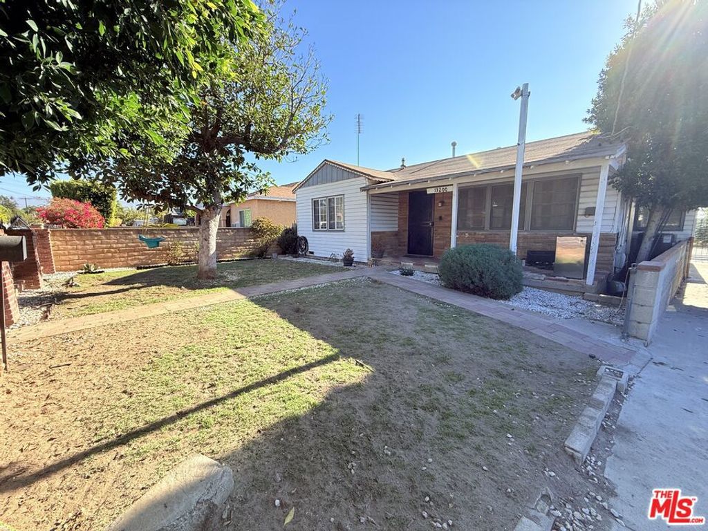 Photo of 13200 Glamis Street, Pacoima, CA 91331 (MLS # 25616079)