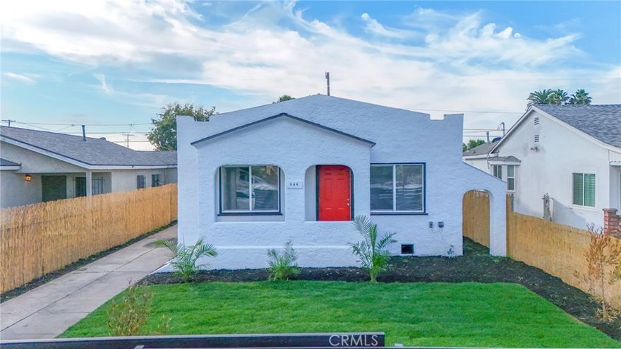 Move in ready... Features include: 3 Bedrooms / 2 Bathrooms, Beautiful kitchen with granite counter tops, updated bathrooms, Tile flooring in Living room, Kitchen, and Baths, New Carpet in Bedrooms. Uncovered driveway parking + Garage parking. Alarm on property, Freshly painted interior and exterior. This is a must see!