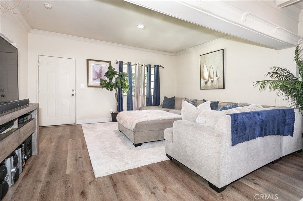 Photo of 1041 W 48th Street, Los Angeles, CA 90037 (MLS # PF26061180)