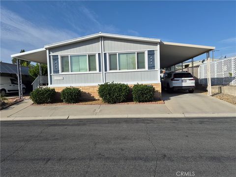 Photo of 1346 Woodbrook Sq, Corona, CA 92882 (MLS # IG26094147)