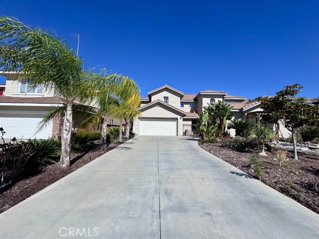 Welcome to this stunning and expansive 5 bedroom, 3.5 bathroom home located in a highly desirable Murrieta neighborhood. Offering over 3,800 square feet of living space, this property features a flexible floor plan, modern upgrades, and plenty of room for the whole family. As you enter, you'll be greeted by an open-concept layout filled with natural light. The gourmet kitchen is a chef’s dream, complete with sleek quartz countertops, a stylish tile backsplash, center island, and stainless steel appliances. The kitchen opens to the main living and dining areas, creating a seamless space ideal for both everyday living and entertaining. One bedroom is conveniently located downstairs making it perfect for guests or a home office, along with a dedicated laundry room for added functionality. Upstairs, you’ll find a cozy nook area that can easily be used as an office, homework station, or quiet reading space. All five bedrooms are generously sized, and the luxurious primary suite features an oversized ensuite bathroom with dual sinks, soaking tub, walk in shower shower and a walk-in closet with two separate entrances. The home also includes 3.5 beautifully updated bathrooms with modern vanities, updated lighting, and clean finishes throughout. Venture outside to enjoy the large backyard, which features a covered patio, a grassy area for play or relaxation, and plenty of space to entertain outdoors. Landscaping is included in the price! The property includes a 3 car garage setup, with a 2 car bay plus a separate 1 car garage, great for extra storage, a gym space, or workshop. This home offers the perfect combination of size, style, and functionality in a fantastic location. Schedule your showing today, this one won’t last long!