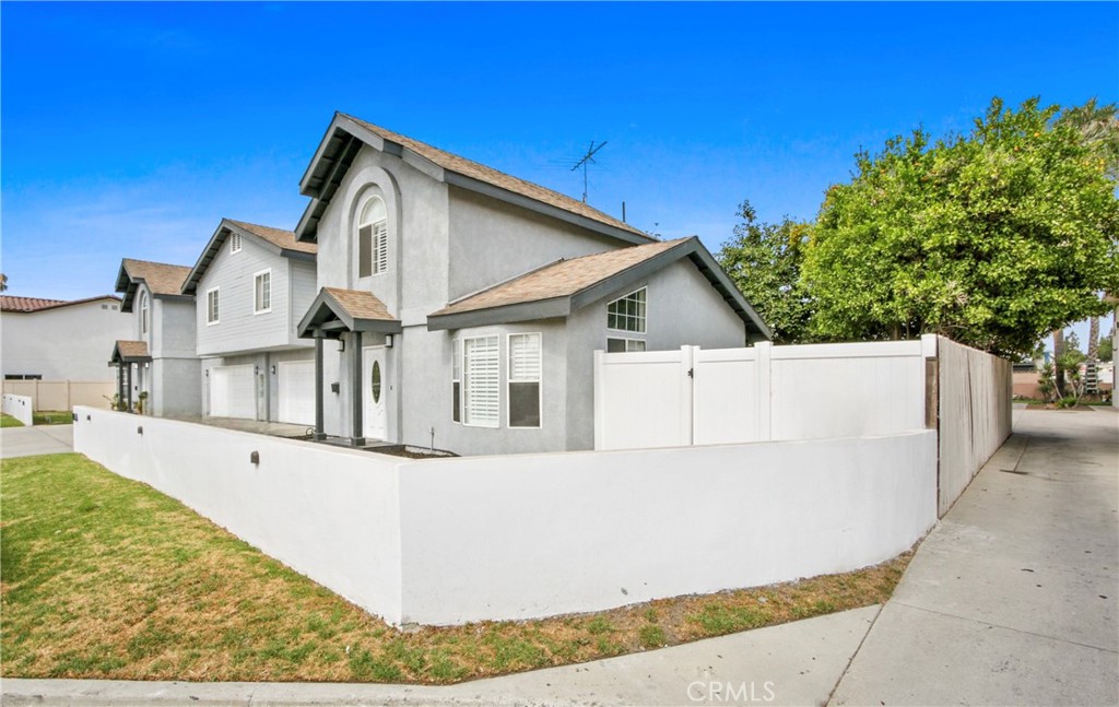 Duplex - Opportunity knocks!!! A rare, turnkey duplex offering space, style, and flexibility. Each spacious unit features 3 bedrooms and 3 bathrooms (total living area approx. 2,934 sq ft) on a generous 9,421 sq ft lot with each unit allowing occupant(s) direct access to 2-car attached garages. One unit has been thoughtfully updated with a fresh, contemporary aesthetic: a remodeled kitchen showcasing crisp white cabinetry, a quartz waterfall countertop, and a custom herringbone marble backsplash, complemented by new fixtures, recessed lighting, and luxury vinyl plank flooring. Primary bedroom and bath suite has been tastefully remodeled, featuring new vanity, sleek tile, updated mirror, glass shower enclosure, and new tile floors. The second unit mirrors the same spacious layout and has been well maintained, comfortable, and move-in ready offering excellent potential to personalize over time while benefiting from the strong fundamentals of the floor plan. Ideal for owner-occupants seeking supplemental income, multi-generational living, or investors looking for a low-maintenance addition to their portfolio. Enjoy a convenient Downey location close to everyday amenities and major commuter routes. A compelling blend of upgraded living and dependable, well-kept spacethis duplex is a standout opportunity.
