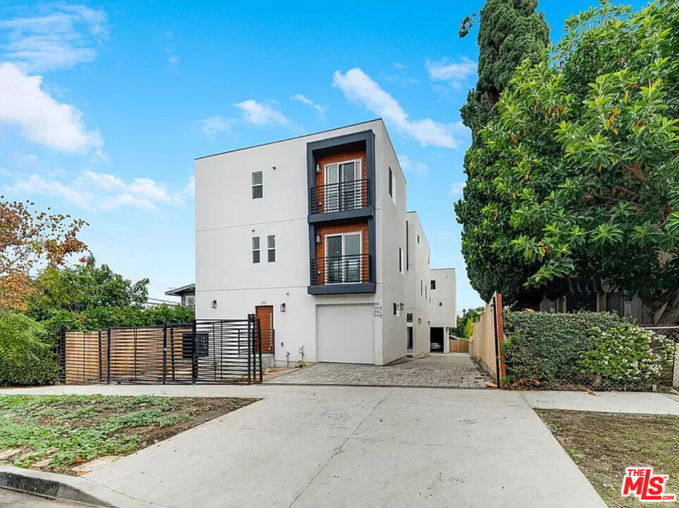 Address: 334 N Alexandria Ave. Los Angeles, CA 90004Welcome to 334 N Alexandria Ave, a sleek and stylish tri-level townhome nestled at the crossroads of Silver Lake, Rampart Village, and Echo Park. This modern 3-bedroom, 2.5-bath home is designed with both comfort and versatility in mind each bedroom includes its own en-suite bath and walk-in closet, offering the ultimate in privacy and convenience.The flexible first-floor suite is ideal for guests, a home office, or studio space. Head up to the main level and you'll find a sun-drenched open-concept living area with soaring ceilings and oversized windows. The designer kitchen features stainless steel appliances, stone countertops, custom cabinetry, and a full backsplash perfect for cooking, entertaining, or simply relaxing in style.Additional amenities include in-unit laundry, two reserved gated parking spots, and central air and heat. Enjoy unbeatable access to local hot spots, vibrant nightlife, and major freeways. Broker/Agent does not guarantee or warrant the accuracy of the square footage, lot size, or other information concerning the condition or features of the property. Broker/Agent is not responsible for any inaccuracies contained herein. Tenant is advised to independently verify all information.