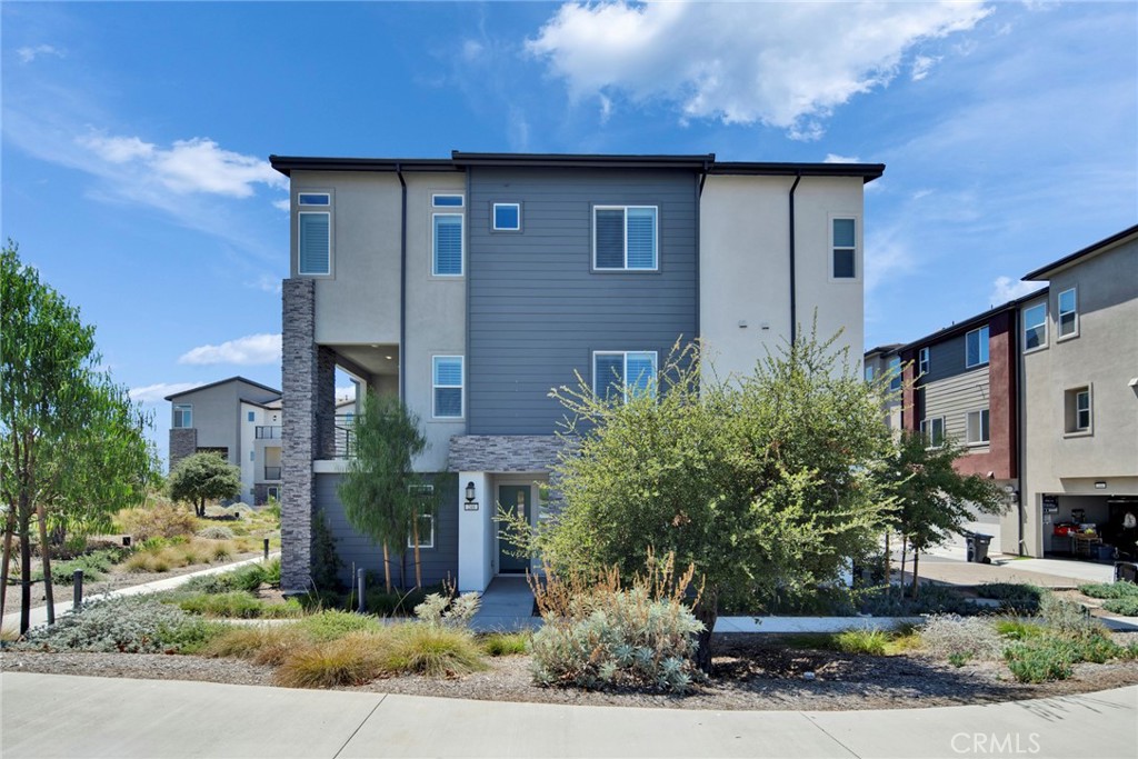 VIEW! VIEW!VIEW!This brand-new modern home, completed in 2024, offers 2,336 sqft. Live just around the corner from Solis Park K-8 School with stunning city and mountain views. As a desirable corner unit, it enjoys abundant natural light, unobstructed scenery, and extra privacy.
The home features 4 bedrooms and 3.5 bathrooms+Loft, thoughtfully designed for comfort and convenience. The entire house has been upgraded with new stylish Vinyl flooring. The first floor includes a private guest suite, perfect for multi-generational living. The second floor boasts an open-concept kitchen and a spacious living room with a balcony, ideal for both entertaining and everyday living. The master suite on the third floor features large windows with a panoramic 180° view.
The epoxy-coated garage floor adds both style and practicality. Walking distance to Solis Park School (K-8) and the highly acclaimed Portola High School, making school drop-offs and pick-ups convenient and hassle-free.
Located in solis Park community, residents enjoy resort-style amenities including pools, clubhouses, playgrounds, and expansive parks. Combining luxury, convenience, and top-ranked schools, this home is truly a dream residence you won’t want to miss.