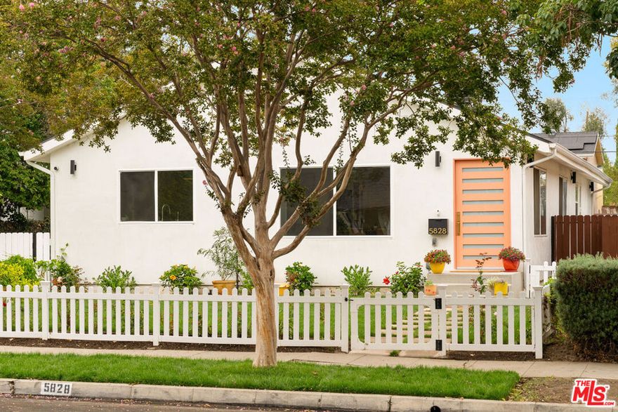 Welcome to this extraordinary modern residence, featuring a fully remodeled ultra-chic 3-bedroom, 3-bathroom home, a spacious new ADU, and a luxurious pool. Nestled on a picturesque, tree-lined street, this turnkey property seamlessly fuses contemporary style with easy, comfortable living.  Step inside to discover an airy and open-concept floor plan awash in natural light, flowing in through expansive windows and stunning skylights. The chef's kitchen is truly a culinary dream, equipped with premium Thermador stainless steel appliances, butcher block counters, a grand island with bar seating, and a walk-in pantry designed for ample storage. The spacious primary suite offers a private sanctuary complete with a walk-in closet and ensuite bathroom. Indulge in luxury with a dual sink vanity, a glass-enclosed shower, and a sumptuous soaking tub. Two additional well-appointed bedrooms share a stylish full bath. Venture outside to find an entertainer's paradise. The backyard is a welcoming oasis, showcasing pristine green turf, a Trex deck, and a sparkling new pool with spa, Baja shelf, and convenient outdoor shower. Multiple lounging and recreation areas invite endless enjoyment. Moreover, the property includes a large fully permitted ADU with its own kitchen, laundry, and spacious bathroom, ideal for hosting family and guests or generating rental income. Additional features of this gem include a charming powder room, easy access attic storage, laundry closet, dual-paned windows, solar panels and EV charger. The down-to-the-studs meticulous remodel boasts updates such as a new roof, updated electrical and plumbing, tankless water heaters, and a new central HVAC system with Nest thermostat. Conveniently located near major thoroughfares, metro station, studios, shopping centers, and local eateries, this perfect compound embodies the essence of easy, classic California living at its finest. Welcome home!