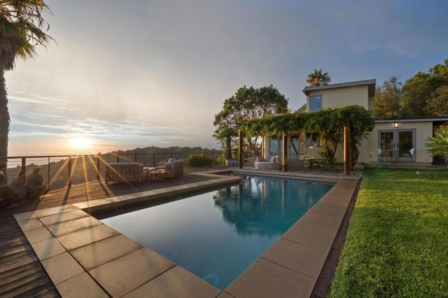 Welcome to 46250 Pfeiffer Ridge Road, an exquisite retreat nestled in the heart of Big Sur, California. This serene haven offers a luxurious and soulful escape with sweeping views of the Pacific Ocean. From the moment you arrive, youll be captivated by the panoramic vistas, complemented by an expansive wraparound deck, charming arbor, and a solar-heated pool.  The main 1,700 square foot residence features three bedrooms and two beautifully appointed bathrooms, blending comfort with understated sophistication.  Wander down one of the sculpted steel paths to discover the private two-bedroom whimsical 550 square foot guest house that is perfect for visitors, infused with the unique charm of Big Sur.  This rare opportunity invites you to own a piece of Big Surs breathtaking natural beauty.