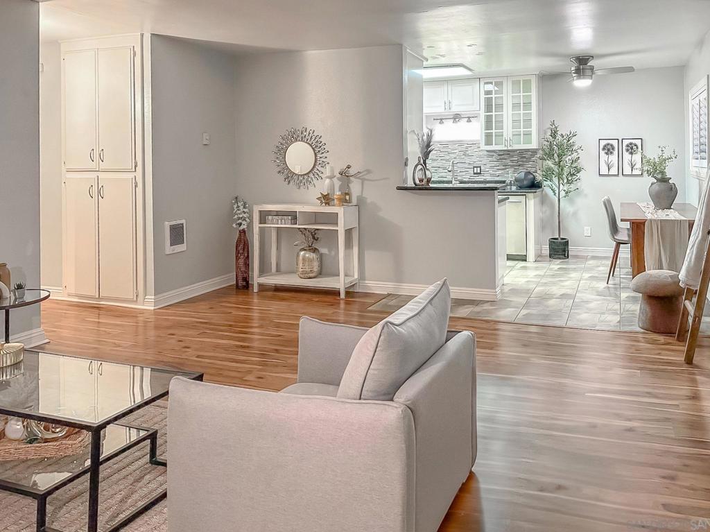 Why rent when you can own in one of San Diego’s most vibrant neighborhoods? This updated top-floor 2BR/2BA condo in the gated Cityscape community offers the perfect balance of comfort, convenience, and value. Step inside to find a bright, open living space with dual-pane windows, plantation shutters, and stylish laminate flooring. The kitchen features granite counters, stainless steel appliances, and a breakfast bar, perfect for casual dining or entertaining. Both bathrooms have been refreshed with new vanities, sinks, and faucets, while three new ceiling fans add comfort throughout. The primary suite offers its own bath and generous closet space, while the second bedroom is ideal for guests, a home office, or a roommate. Enjoy the view of the peaceful landscaped courtyard from your private retreat. Community amenities include a sparkling pool, BBQ area, outdoor seating, and gated entry. Laundry is on-site, with the option for an in-unit hookup (with HOA approval). Assigned parking space (#157) is included. Best of all, this home is just a quarter mile from Adams Avenue with its dining, shopping, and nightlife, and close to Kensington, Normal Heights hot spots, and freeway access. VA-approved complex and eligible for low down payment financing programs, making this an excellent opportunity for first-time buyers to build equity. Priced below market won't last!