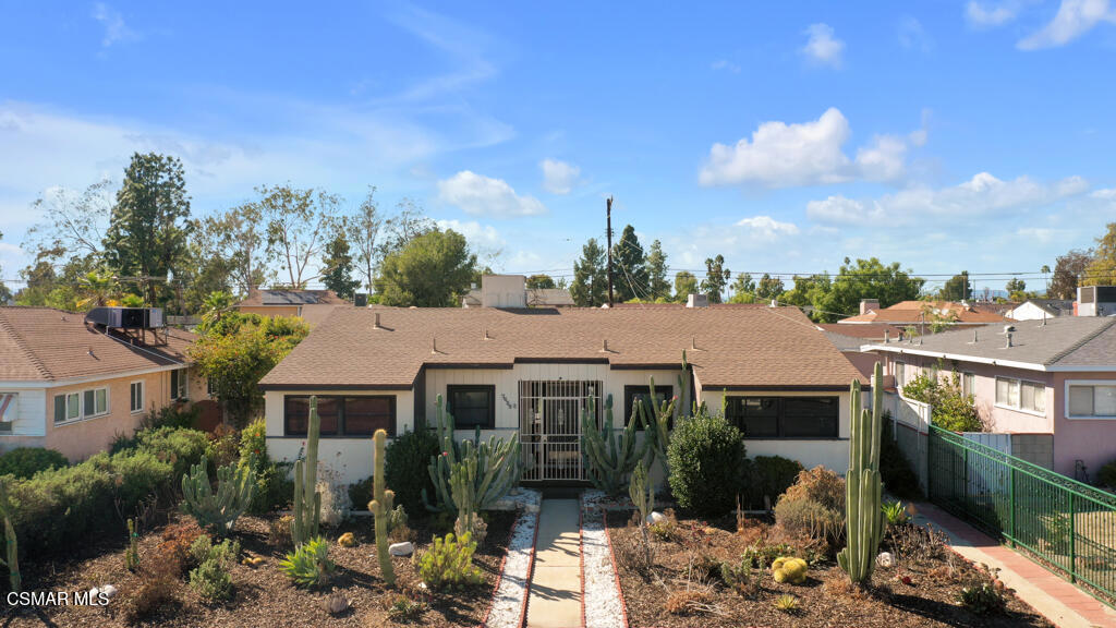 Charming Home with Great Potential - A Must See! Welcome to this charming home with immense potential. With a landscaped front yard and floor to ceiling windows overlooking the rear yard, this three-bedroom, two-bathroom residence is ready to welcome its next owners. Situated on a sizable and flat lot, this property offers endless possibilities, including the potential for multiple ADUs (Accessory Dwelling Units) or a fantastic workshop. Additionally, the detached two-car garage and separate detached office provides ample space for parking and additional customization. Upon entering, the many windows add character, natural light and charm to the living space. The three bedrooms ensure comfort and privacy for the entire family, while the two well-appointed bathrooms provide convenience and functionality. Indoor laundry room off the kitchen is another added bonus. One of the standout features of this property is the sliding gate to the backyard, catering to those with recreational vehicles or a need for extra space. Off the main house, a delightful back covered patio creates an inviting atmosphere for entertaining or relaxing. Conveniently located, this home is in close proximity to a wide range of amenities, including shopping, dining, entertainment options and easy freeway access. Don't miss the opportunity to explore this great property and envision the endless possibilities it holds.