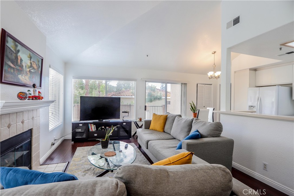 This beautiful corner unit is in a fantastic location, just a short drive from Laguna Beach and its famous beaches. The two full-size master bedrooms and full baths provide great space. The living room with its balcony and views of the greens is perfect for enjoying the natural surroundings and entertaining. Laundry is inside and has a large laundry room and can be used for storage. With plenty of natural light throughout the unit, it creates a bright and airy atmosphere. The spacious kitchen and living room with a beautiful fireplace provide a comfortable living space. This unit is like a great place to call home, especially for those who enjoy coastal living and easy access to great restaurants and shopping and LAGUNA BEACH School District.