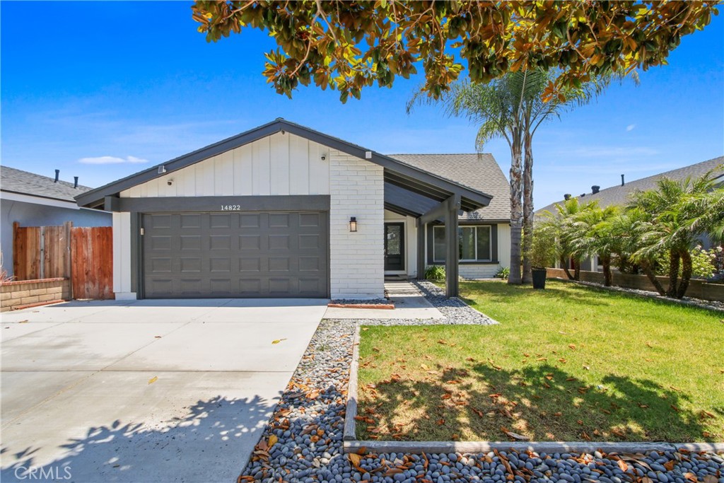 Welcome to 14822 Foxcroft Rd, a spacious and tastefully updated home located in a quiet neighborhood in Tustin. This 3-bedroom, 2.5-bathroom property features nearly 2,000 square feet of living space with dark hardwood floors, an upgraded kitchen with granite countertops and stainless steel appliances, and a bright open layout perfect for entertaining. Upstairs bedrooms include custom blackout window coverings and fresh carpet on the staircase. The home also offers central air and heat, in-garage laundry, and an attached two-car garage. Enjoy the private landscaped backyard with a covered patio and spa — ideal for outdoor relaxation year-round. Rent is $5,295/month and includes electricity and sewer. Tenant is responsible for water, gas, trash, landscaping, and spa service. Pets will be considered with an additional deposit of $750 per pet. One month's security deposit required on approved credit. Annual lease. Available for move-in July 15.
