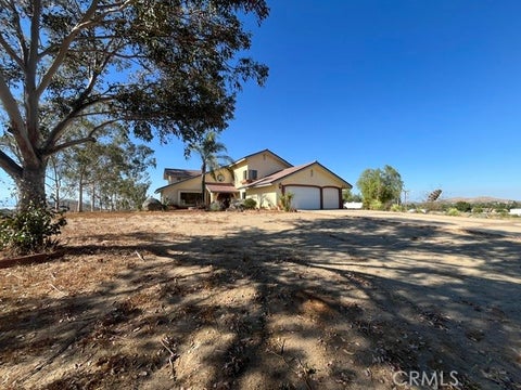 Photo of 16770 Rocky Glen RD, Lake Mathews, CA 92570 (MLS # IG26132937)