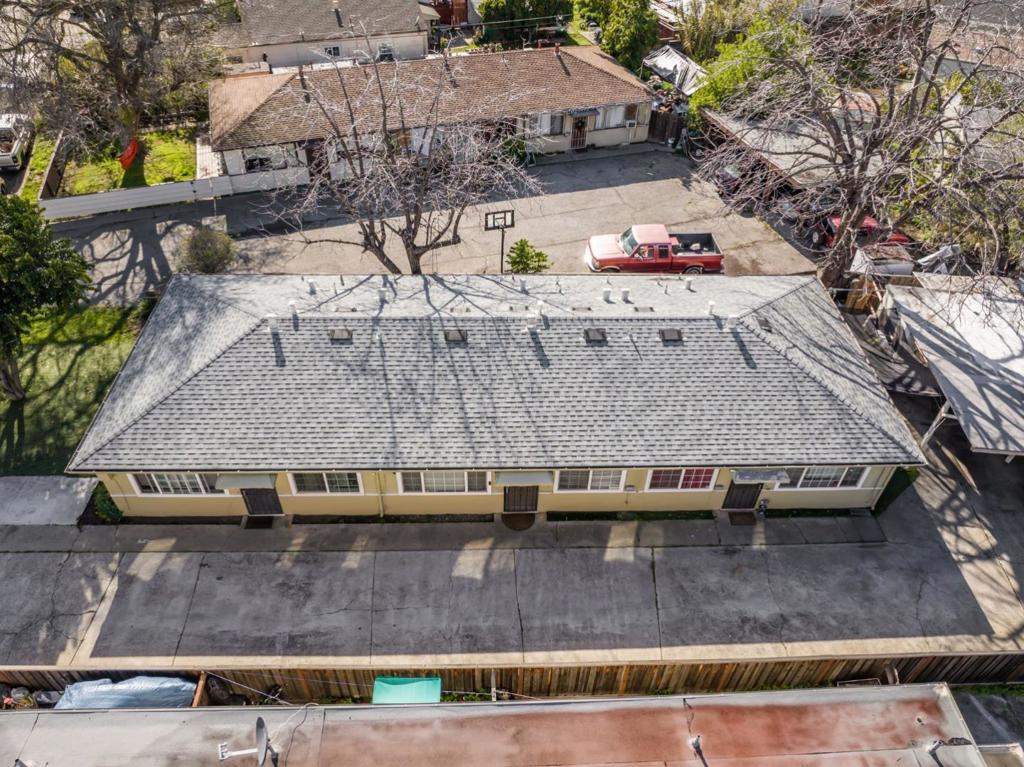 Discover the endless possibilities at 317 Perrymont Avenue, a centrally located triplex offering 1,908 total square feet of interior living space across 3 separate units. Each approximately 636 square-foot unit features a spacious living room, dine-in kitchen, laundry room, one bedroom, and a full bathroom, providing comfortable and functional living spaces for residents. Each of the three units has its own separate meter for water, gas & electricity, ensuring independent and streamlined utility management. The 6,732 square-foot lot includes a large front lawn, a long private driveway, and a covered carport with three dedicated parking spaces. Situated in a prime San Jose location, this triplex offers quick access to commuter routes via Monterey Road, Almaden Expressway & Highway 87. Enjoy the convenience of nearby shopping, dining, and entertainment at The Plant Shopping Center and Santa Clara County Fairgrounds. Whether you're looking for an income-generating investment or a property with future potential, 317 Perrymont Avenue presents an exceptional opportunity. Take advantage of this amazing property before its gone!