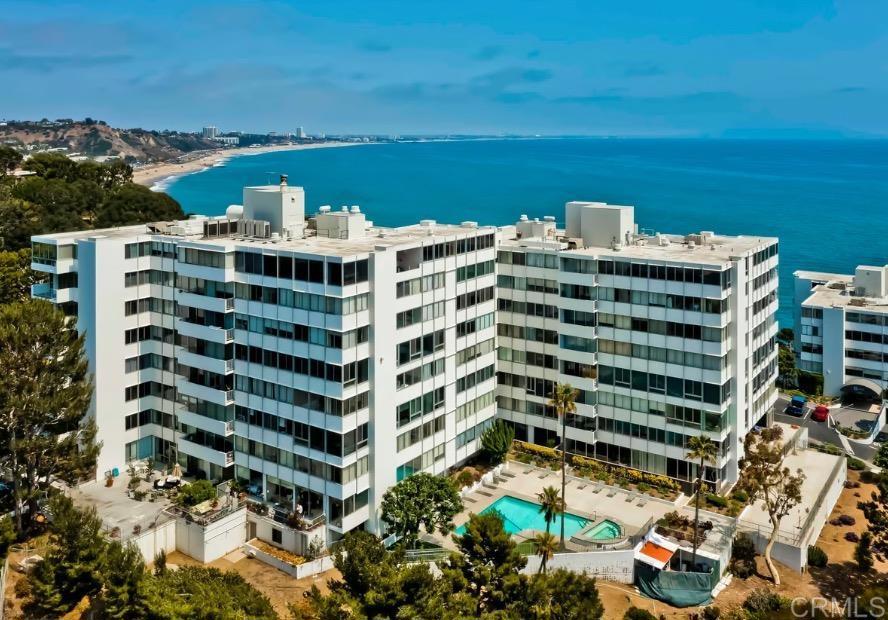 Inspiring Pacific Palisades turnkey 684 sqft, 1 bedroom, 1 bath condominium featuring direct, unobstructed OCEAN VIEWS, western facing sunsets, ocean breezes, high ceilings, expansive viewing windows, a large primary bedroom with a large viewing balcony to enjoy the breezes and sunsets, located in the prestigious EDGEWATER TOWERS which is located in the Pacific Palisades and walking distance to famous Sunset beach, restaurants and entertainment. Wake up to paradise! This property features nine acres of walking trails with panoramic ocean views stretching from the Santa Monica Mountains, Palos Verdes Peninsula and Catalina Island. Private garage parking with assigned space and storage area included. Guest parking also available onsite. Association dues INCLUDED in rent. Edgewater Towers amenities include 24 x 7 guard gated security, 2 salt water pools and spas, private gym, lighted tennis and sports courts, gazebo with BBQ area and secure parking.