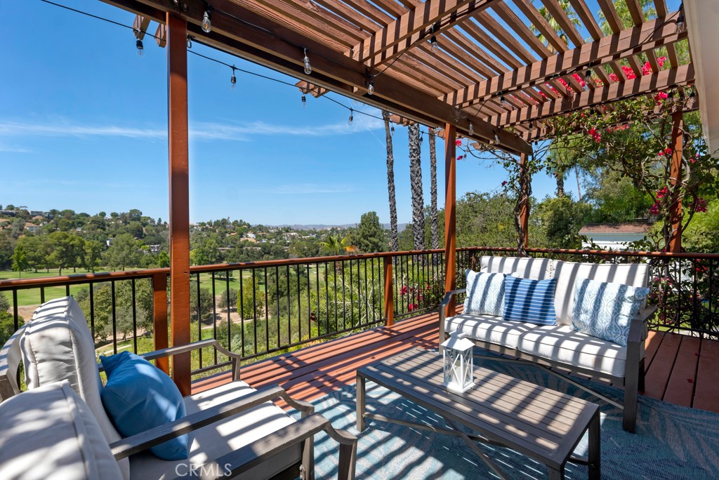 Passing through the hand-crafted wrought iron security gates and arriving at the hidden oasis of 20994 Bandera Street, you'll immediately recognize the crown jewel of the neighborhood. This stunning residence is perfectly positioned to capture breathtaking, panoramic views of the Woodland Hills Country Club golf course—offering a sense of total privacy, exclusivity, and uninterrupted tranquility. Inside, the thoughtfully reimagined interior blends modern upgrades with timeless elegance. The beautifully remodeled gourmet chef’s kitchen is a culinary dream, showcasing high-end finishes, custom cabinetry, and premium appliances. Sophisticated lighting accents flow throughout the expansive 2,191 square feet of soaring living space, featuring a grand master wing and three generously sized bedrooms. Technological innovation meets everyday convenience with a fully upgraded 200-amp electrical panel, a state-of-the-art SPAN smart panel that allows you to monitor and dynamically control circuits directly from your phone, and a Tesla solar system with Powerwall—providing energy efficiency, backup power, and control like never before. The level, sprawling grounds are truly unmatched, offering a romantic courtyard, an expansive turf lawn, custom hardscaping, 22 mature fruit trees, and resort-style landscaping. Enjoy dazzling daily sunsets, peaceful wildlife sightings, and unmatched serenity from your private master viewing deck and enchanting outdoor sitting area. Electric sun blinds on all windows add both comfort and convenience. This exceptional property is more than just a home—it's a private sanctuary, ideal for high-end, peaceful luxury living with top-tier community amenities just minutes away. 20994 Bandera Street represents a rare opportunity to own one of Woodland Hills' most prestigious view estates, fully upgraded for modern life.