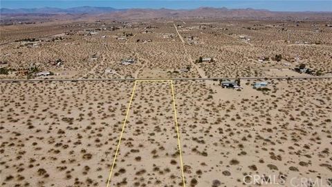 Photo of 1155 Belfield Boulevard, Landers, CA 92285 (MLS # JT26028349)