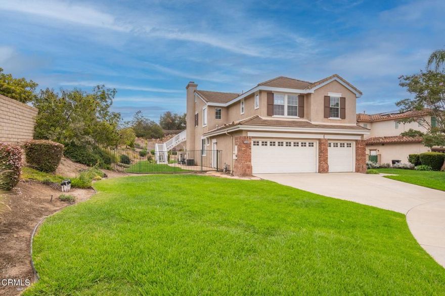 Looking for a property with land? Welcome to 116 Via Escondido, a unique home tucked away at the end of a cul-de-sac on an expansive 17,859 sq. ft. lot with a three car garage. Enjoy breathtaking mountain views, no rear neighbors, and the added privacy of block walls while relaxing in your custom PebbleTec pool and spa. A cozy outdoor fireplace creates the perfect ambiance for evening gatherings, and the spacious backyard is ideal for hosting family and friends. Off the primary bedroom, a custom covered deck provides a private retreat with direct access to the backyard. Inside, high ceilings and an open floor plan create a bright, airy feel. The kitchen flows seamlessly to the back patio, making entertaining effortless. One bedroom is conveniently located downstairs next to a full bath and laundry room, while upstairs you'll find three more bedrooms, two full bathrooms, and a versatile loft--perfect for a home office or second living area. One of the bedrooms even features an oversized closet that can double as extra storage or a fun playroom.This inviting home is within walking distance to Dos Vientos Community Park, Sycamore Canyon K-8 School, and nearby shopping, with scenic hiking trails just minutes away.