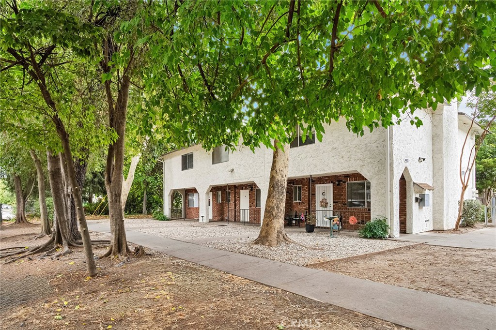 Premier Investment Opportunity! This beautifully updated tri-plex, situated near Downtown Chico, Chico State, shopping, and dining, features three 1,300 sqft townhouse-style units, each with 3 bedrooms and 3 bathrooms. Each unit showcases newer vinyl plank flooring, inviting living rooms with classic brick fireplaces, and modern kitchens equipped with white appliances, including newer dishwashers, gas stoves, ranges, refrigerators, and garbage disposals. Enjoy private fenced patios, ample storage, central heating and cooling, in-unit washers and dryers, and off-street parking. Professionally managed, this property is an ideal turnkey investment in a prime location.