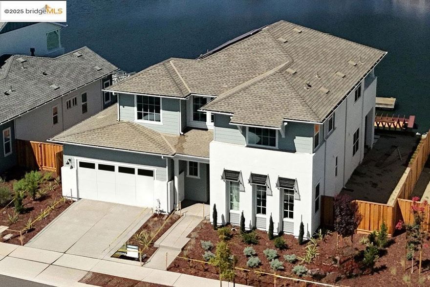 BRAND NEW CONSTRUCTION! No waiting opportunity to capture a Luxury Davidson Communities Home on deep Delta water with private boat dock in the Highly Sought-After Award-Winning Delta Coves Community! The Starboard offers an open concept floor plan that lives like a single-story with the primary bedroom & secondary bedroom on the main level with 2 additional bedrooms upstairs for family & guests. This home includes DESIGNER SELECTED FINISHES & decking from the back of the home out to your EXTENDED DECK for outdoor entertaining! Enjoy every moment of water living & water activities or just enjoy water views and sunsets over Mt. Diablo. Be ready for activities, entertaining & meeting neighbors at Island Camp where you can swim in the year-round heated pool, get a workout in at the gym, shoot pool in the club house, play Pickle Ball, get a sand volleyball game going or mingle at a community planned event. This gorgeous 4-bedroom home is well appointed with a 48" Kitchen Aid SS slide-in range, upgraded kitchen, neutral colors and ready for your personal touches. Pack your bags because this energy efficient home with SOLAR included is ready to move-in! Every Day is an Open House, just visit the Davidson Sales Office in the model complex and don't delay because this home won't last long