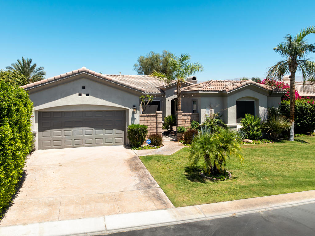 LONG-TERM RENTAL -- Your Desert Daydream, Delivered. Freshly renewed from top to bottom, this turnkey haven blends easy luxury with everyday joy inside La Quinta's gated Esplanade community--just minutes from world-class dining, entertainment, and the Indian Wells Tennis Garden. Step onto chic Truwood plank ceramic flooring and into a magazine-worthy chef's kitchen, complete with soft-close cabinetry, sparkling quartz counters, under-cabinet lighting, a sleek coffee bar, and island seating that's perfect for morning lattes or evening chats. The open-concept living area flows seamlessly into a private, resort-style backyard--take a dip in the saltwater pool, unwind in the spa, gather around the built-in fire pit, and host with ease thanks to integrated surround sound. An artificial-turf side yard offers low-maintenance play space (and room for four-legged friends, if permitted). The serene primary suite feels like a spa retreat, featuring a custom shower that wraps around a freestanding soaking tub and an expanded, beautifully organized walk-in closet. Need extra space? The detached casita is a game-changer for guests, a home office, or a private lounge--complete with its own bath, coffee bar, sink with disposal, and mini-fridge. Smart-home tech keeps life simple with app-friendly control of lighting, appliances, washer/dryer, and the garage door. Fully turnkey furnished--including kitchenware and bath essentials. Owner covers landscaping, pool service, and HOA fees so you can simply enjoy.
