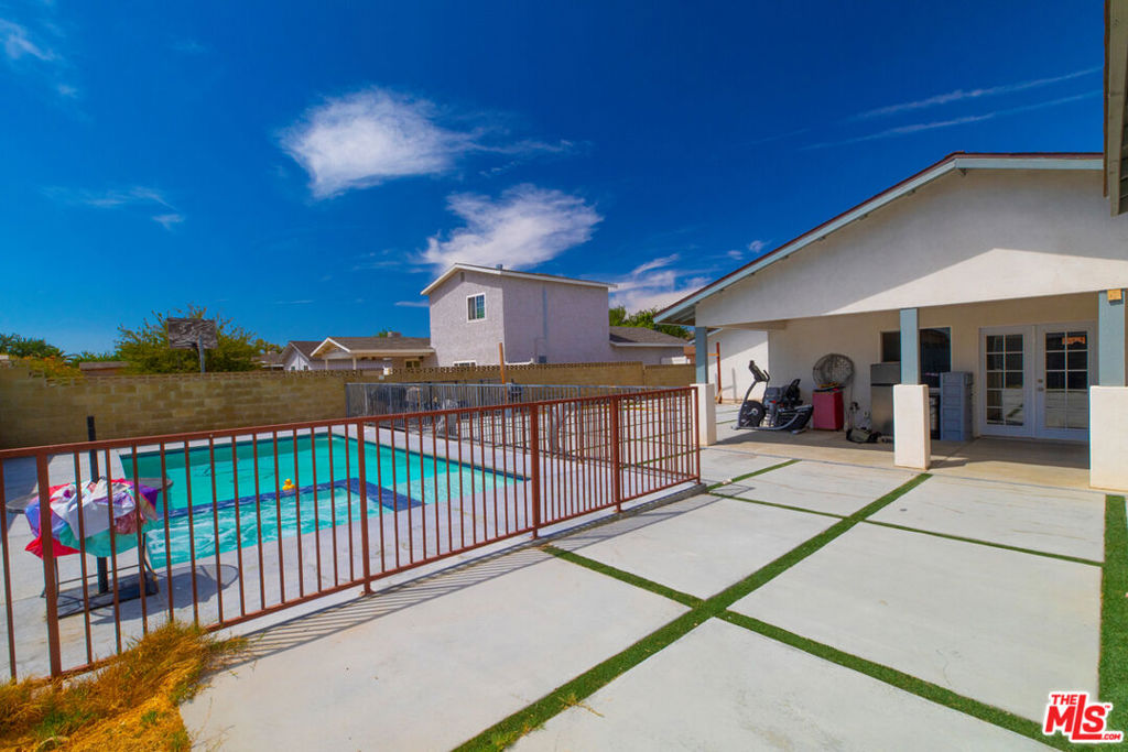 Beautiful, gorgeous, fully remodeled, renovated home in the heart of Lancaster with lavish touches through out, sparkly counter tops and kitchen island with seating for 10 people, with built ins and lots of cabinetry. ceramic tile floors, crown moldings, whole house water filtration, floor tub in master bathroom, newer roof, with an amazing fenced heated pool with a jacuzzi, a nice gazebo next to pool for comfortable sunny family entertainment, covered entrance and rear porches with seating area for relaxation, 4 bedrooms, 2 bathrooms, laundry in garage with a convenient folding stone table, fully fenced, exceptional large concrete slab blocks with turf around them through out back yard and side driveway, attached garage with a electric roll up door.
