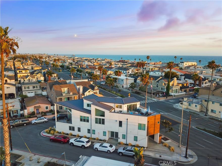 A Coastal Gem with Exceptional Value and Elegance on the Balboa Peninsula



Nestled just a gentle sea breeze from the beach and built in 2017, this magnificent Newport Beach property offers not only an impeccable coastal lifestyle but also the financial flexibility of a transferable "Newport Beach SHORT-TERM RENTAL PERMIT". Whether for personal enjoyment or rental income, this rare feature enhances its appeal.



A beacon of coastal elegance, this Balboa Peninsula treasure spans three levels, offering expansive living spaces infused with high-end luxury. Fully furnished and turnkey, the home boasts three spacious bedrooms, a versatile loft, and three sophisticated bathrooms. Every corner is meticulously crafted to ensure both beauty and functionality.



Soaring vaulted ceilings and grand windows bathe the interiors in radiant California sunshine, while wide-plank white oak floors and contemporary touches like stainless steel cable railings and stylish pendant lighting create a modern, inviting retreat.



The chef’s kitchen is a showstopper, featuring pristine quartz countertops, a large entertainment-ready island, sleek European cabinetry, and premium stainless-steel appliances. The open-plan living areas flow effortlessly, perfect for daily living and hosting.



The primary suite is a private oasis designed for relaxation, with a spa-inspired bathroom, walk-in shower, soaking tub, and spacious walk-in closet.



Outdoors, the rooftop terrace steals the show, offering panoramic views from coastline to skyline. It's ideal for sunset gatherings or quiet reflection and ready for a hot tub addition.



Built with sustainability in mind, the home features fully paid-off solar panels (2018), recessed lighting, central heating/air conditioning, and a built-in wine refrigerator.



Parking is convenient with a single-car garage and additional covered space. Located a block from the beach and within walking distance to fine dining, premier shopping, and vibrant beachside activities, this home offers not just a residence, but a sophisticated lifestyle of leisure and luxury.



Thank you for considering this extraordinary turnkey coastal sanctuary.