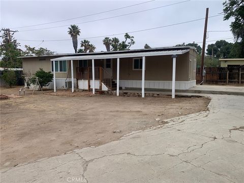 Photo of 25806 Creag Avenue, Homeland, CA 92548 (MLS # SW26090121)