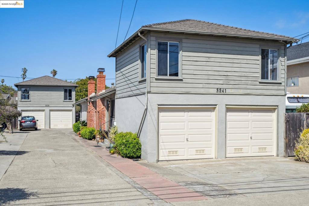 Rare opportunity to acquire two side-by-side duplexes in Alameda's coveted East End. 3239 and 3241 Briggs, sold together, are four total units (2BR/1BA each) eahc w/ fireplace and attached garage. There's a long driveway for plenty of additional tandem parking, plus potential for up to four additional ADUs on site (buyer to verify). Three units will be delivered vacant and ready for your design vision. Landscaped yards with room for expansion. The current owner converted one unit into an artist studio, showcasing the flexible live-work potential. One unit per building is single level, and each lot is zoned R4. Located two blocks from Lincoln Park, twelve years of top-rated schools, and near to the golf course, South Shore Shopping Center, Oakland Airport, and ferry service. This tight-knit neighborhood hosts an annual block party, reflecting the strong community spirit. Whether you're seeking rental income, owner-occupancy with investment potential, or development opportunities, these properties offer multiple pathways to success. Cosmetic updates will unlock significant value in this desirable location. Please see MLS #41101167 for 3239 Briggs.