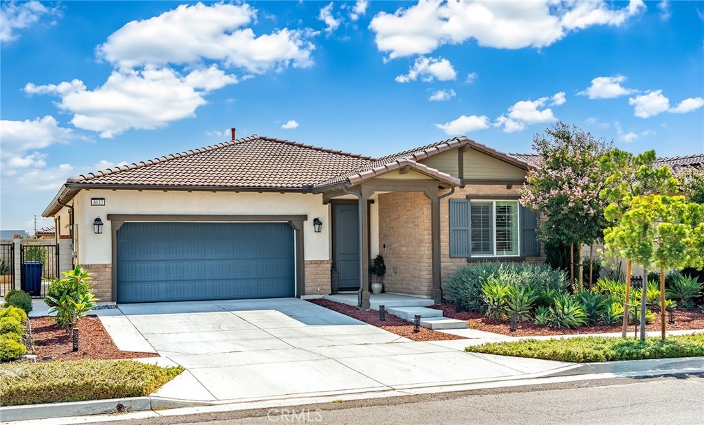 Located in the desirable senior 55+ gated community of Esperanza, this 2 bed, 2 bath single-story home was built in 2022 by Lennar and offers modern comfort with tasteful upgrades. The kitchen features premium finishes, complemented by upgraded flooring, shutters, a water softener, extra wide doorway and master shower stall for handicap access and an epoxy-coated garage floor. Enjoy resort-style amenities at the La Jolla Clubhouse, including a fitness center, pool, pickleball courts, and dog park. Just 3 minutes from major shopping and dining at The Station, this home also includes leased solar panels for energy efficiency (buyer to assume lease).