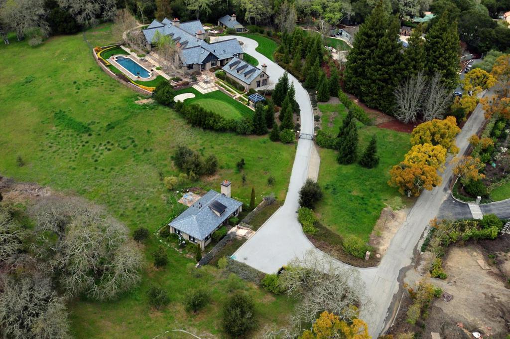 Stunning 7acre English-inspired custom built compound features a main residence and two separate cottages.The lavish interior is defined by extraordinary designer finishes that radiate elegance throughout the amazing two story reception area,highlighted by custom Venetian plaster walls evoking a soothing light filled atmosphere.The central Woodside location is surrounded by some of the most exclusive estate properties in Northern California,great dining,shopping and easy access to major commute routes.