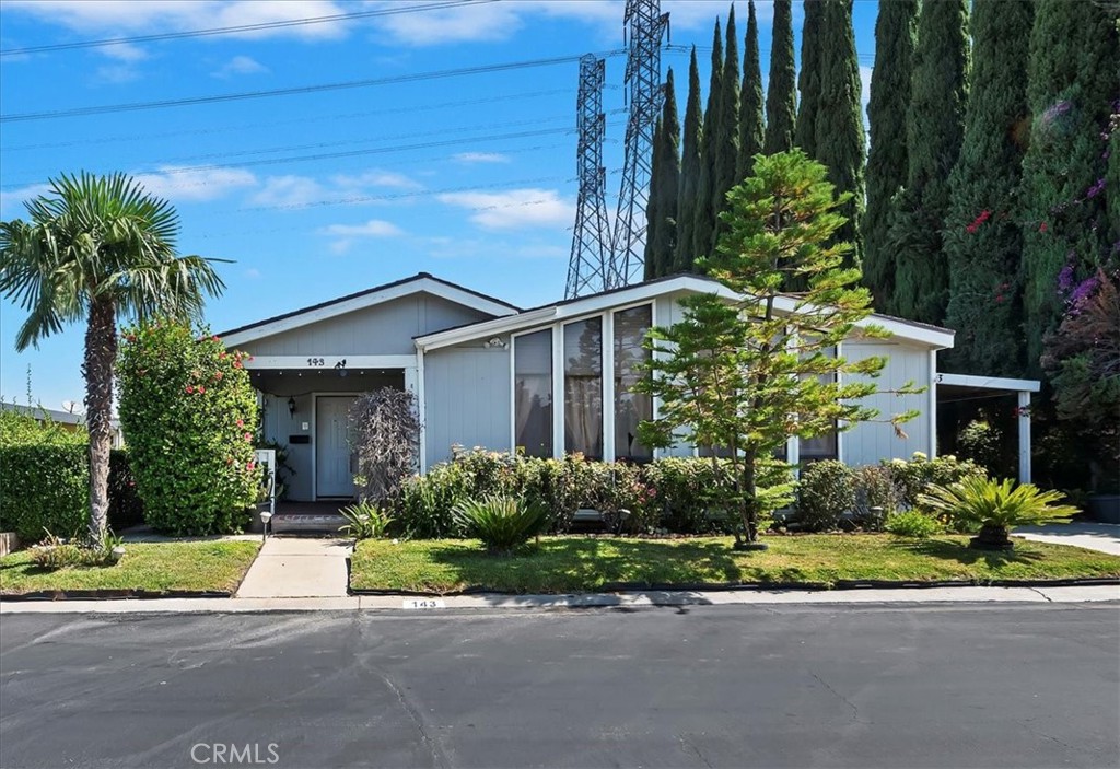 Welcome to your dream home in this vibrant +55 community! This spacious 2-bedroom, 2-bathroom triple-wide mobile home offers comfort and modern living, perfect for enjoying your golden years. Step inside to discover an open floor plan with abundant natural light, featuring a large living area that seamlessly flows into a well-appointed kitchen with ample storage and counter space. The master suite is a true retreat, complete with an en-suite bathroom for added privacy. Two additional bedrooms provide flexibility for guests or hobbies, while the second bathroom ensures convenience for all. Enjoy outdoor living on your private porch, ideal for sipping morning coffee or evening relaxation. Home backs up to the Plantation orchard so you have no back neighbors and the convenience to pick fruit when ever the mood strikes you. The community boasts fantastic amenities, including a sparkling pool and soothing spa for ultimate relaxation. Stay active with a game of tennis or practice your putt on the well-maintained putting green. Take in the serene lake views or gather with friends at the clubhouse and billiard room for social events and activities. This home truly offers a fulfilling lifestyle in a welcoming community—your perfect haven awaits!