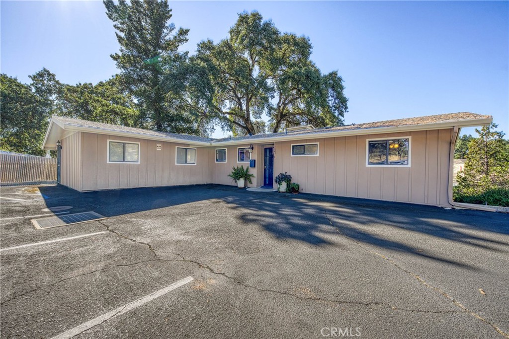 Live/Work in this move in ready property. Currently an office building with a full kitchen, bathroom, reception area, waiting room, 4 offices and a storage shed. All in excellent condition. The building is located on high traffic 11th St. A well-placed sign could give 1000’s of views a day. Don’t miss this opportunity to own this live/work property. The property can also be converted back to a residence with proper permitting. There are a lot of possibilities with this property. Office, Live/Work, or Residence. You pick.