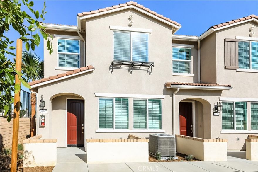 This home is professionally managed by Tricon Residential, dedicated to creating exceptional rental experiences. Featuring three bedrooms, two and one half bathrooms, and approximately 1,382 square feet, this townhome offers a high standard of rental living, supported by a team that puts residents first. Tricon Wildomar is a beautiful Spanish-inspired gated community centrally located just one hour from San Diego and Orange County. Enjoy virtually maintenance-free living with the conveniences of solar and smart home technology including automatic thermostat control and keyless front door entry all designed to provide an exceptional living experience. Every home includes an open-concept design, gourmet kitchens with quartz countertops and stainless steel appliances. Enjoy well-maintained amenities including a sparking pool with wifi, tot lot/playground, dog park, fitness center and clubhouse with rentable event space.