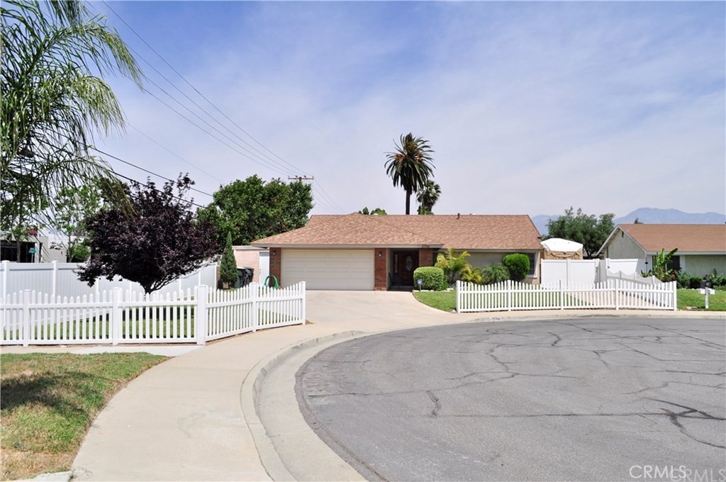 Beautiful home in one of the most desirable Chino communities. Featuring 4 bedrooms and 2 bathrooms, a spacious front yard and well-manicured landscape are stand out features of this cul-de-sac home. The white vinyl fencing impressively lines the yard and a covered walkway invites you to the front door. Open living room and dining area with vaulted ceilings. The kitchen shares the open concept design and flows through the entry area and dining area seamlessly and has outdoor access on both sides via sliding glass doors, perfect for parties. The bedrooms and bathrooms in the home are excellent size and maintain the same level of detail shared throughout the rest of the home. The backyard follows the same lush landscape theme as the front yard and has a wrap around wood covered patio with lighting, and fans. Space and storage are not an issue with 50x12 RV parking with hook ups, a 2 car garage with bonus storage space attached and a premium shed in the back yard. This home feels very private and is an excellent neighborhood.