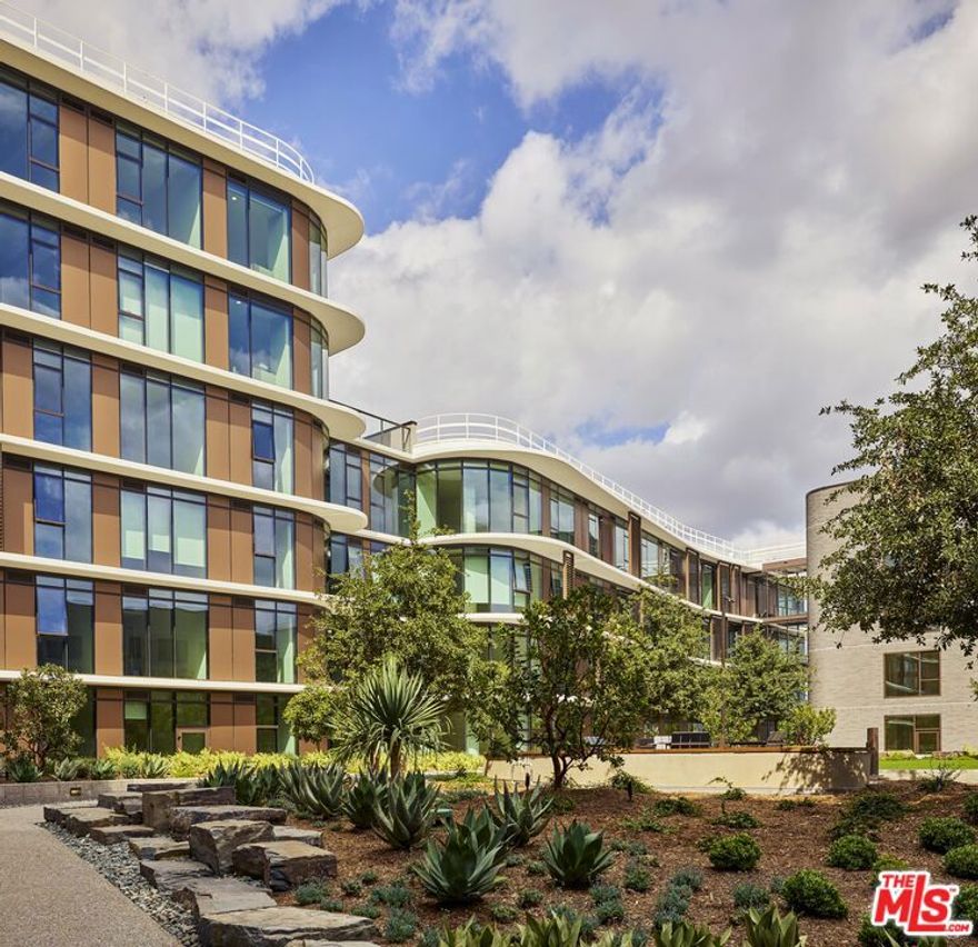 Experience Penthouse living at its finest at 700 Broadway, Santa Monica's premier new luxury address. This impeccably designed residence features an expansive open floor plan, a true chef's kitchen with top-tier appliances, 9 FT. ceilings, and floor-to-ceiling windows that flood the home with natural light. Sweeping ocean, city, and mountain views create a stunning backdrop from every angle. The generous primary suite offers a serene retreat with a large walk-in closet and spa-inspired finishes. Residents enjoy unmatched resort-style amenities, including:* Rooftop pool with panoramic views* Luxurious spa + infrared sauna* State-of-the-art fitness center* Rooftop deck for lounging and sunset cocktails* Bowling alley* Private meeting room* Outdoor lawn + social spaces Modern, glamorous, and moments from Santa Monica's best  this penthouse embodies West Coast luxury living.