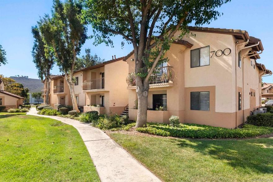 Located in the desirable Villa MonteVina complex of Rancho San Diego, this upper-level condo features peek mountain views, high vaulted ceilings, central heat/AC, in-unit laundry, fresh paint, brand new carpet throughout and a spacious private balcony with storage closet. The kitchen features newly updated cabinets, stainless steel appliances, stone counters and ample cabinet space. The Villa MonteVina community offers two pools & spas, a gym, sauna, tennis & racquetball courts, playground, BBQ's, clubhouse and plenty of guest parking. It's conveniently located walking distance to Cuyamaca College and minutes to shopping, dining, grocery stores, theaters and more. With all paid utilities besides SDGE/internet, this is an excellent personal home or rental investment!