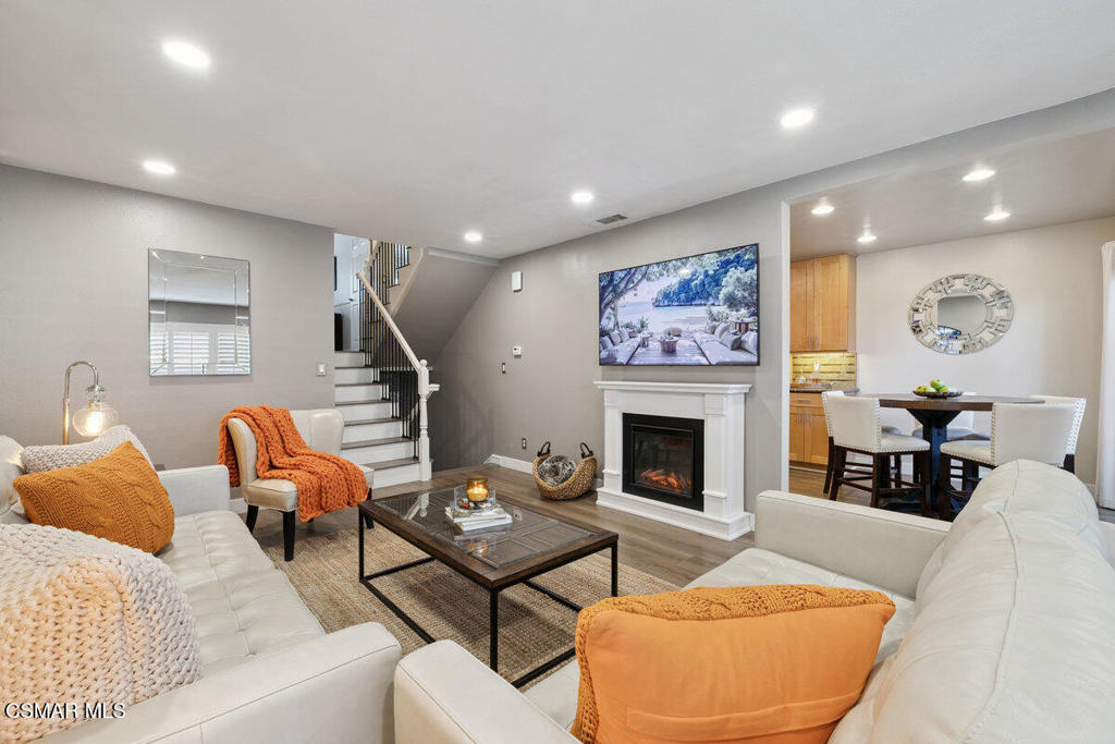 Pride of ownership shines in this beautifully updated and meticulously maintained end-unit Newbury Hills townhome. Offering 3 spacious bedrooms, 2 tastefully updated bathrooms, and direct-access 2-car garage with laundry area with washer and dryer included! Bright and inviting open layout welcomes you with Kaindl waterproof laminate hardwood flooring, newer dual pane windows, custom white wood plantation shutters, newer paint, updated plumbing and recessed lighting throughout! Well-appointed kitchen boasts shaker maple cabinetry, granite countertops, newer stainless steel appliances, and a dining area with newer sliding doors that open to the private patio. The primary suite with vaulted ceilings includes a tasteful, modern ensuite bathroom with a newer subway-tile walk-in shower with custom glass doors, a built-in vanity with granite countertops, and a walk-in closet with ample storage. Two additional bedrooms provide ample space and comfort, each with vaulted ceilings and one with a large walk-in closet. Community amenities include a pool, clubhouse, and dog park. Nearby scenic open spaces, hiking trails, various parks, and award-winning Conejo Valley Unified Schools. Centrally located near shopping, dining and freeway access. This turn-key and move-in ready home is ready to enjoy!