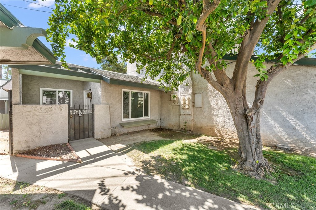Beautifully updated 1-bedroom, 1-bathroom condo with a private patio, located close to the pool. Condo is an end unit with easy access to parking and covered parking. New kitchen with timeless white cabinets and quartz counter tops, plenty of storage cabinets and counter space, kitchen is open to the dining room with sliding glass door with natural lighting. New luxury vinyl plank flooring, updated bathroom, new windows, mirror closet doors. The thoughtful design includes a laundry area with washer/dryer hookups. Take advantage of the community's amenities, including a pool and spa, offering a refreshing escape just steps away from home. The HOA fee covers water, trash, and sewer services, providing a hassle-free lifestyle. This updated condo is not just a residence; it's an invitation to embrace modern living with style and convenience. Schedule a visit and experience the perfect blend of comfort and contemporary elegance.