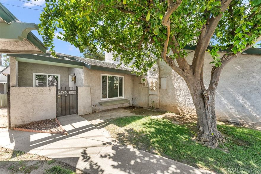 Beautifully updated 1-bedroom, 1-bathroom condo with a private patio, located close to the pool.  Condo is an end unit with easy access to parking and covered parking.  New kitchen with timeless white cabinets and quartz counter tops, plenty of storage cabinets and counter space, kitchen is open to the dining room with sliding glass door with natural lighting. New luxury vinyl plank flooring, updated bathroom, new windows, mirror closet doors.  The thoughtful design includes a laundry area with washer/dryer hookups.  Take advantage of the community's amenities, including a pool and spa, offering a refreshing escape just steps away from home. The HOA fee covers water, trash, and sewer services, providing a hassle-free lifestyle. This updated condo is not just a residence; it's an invitation to embrace modern living with style and convenience. Schedule a visit and experience the perfect blend of comfort and contemporary elegance.