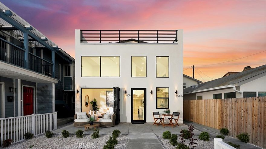 Experience the perfect blend of modern luxury and classic coastal living at this newly remodeled 2025 front-unit home, located just moments from the beach. Offering approximately 1,851 square foot of thoughtfully designed living space, this 4-bedroom, 3.5-bath residence showcases elegance, comfort, and an effortless coastal lifestyle.

Step into the inviting main living area, where soaring ceilings and expansive bi-fold doors create a smooth indoor-outdoor flow, filling the space with natural light and refreshing ocean breezes. The chef’s kitchen features a spacious island and all-new appliances—perfect for both everyday living and entertaining. A main-floor ensuite bedroom provides added convenience for guests or multi-generational living.

Upstairs, the luxurious primary suite serves as a peaceful retreat, complemented by a versatile loft and two additional bedrooms. The home includes numerous modern upgrades, such as new double-pane windows, a brand-new HVAC and AC system, a new water heater, and an EV-ready outlet—enhancing energy efficiency and everyday comfort.

The private rooftop deck is the crown jewel of the home, offering panoramic views of the ocean, bay, and breathtaking sunsets—ideal for relaxation or hosting gatherings.
With its prime location, sophisticated design, and high-end amenities, 808 W. Balboa Blvd offers the best of Newport Beach living.