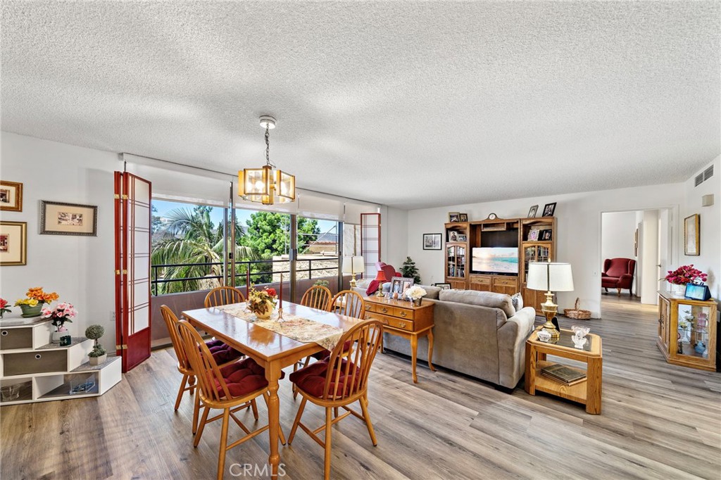 This is a highly sought after "G" floor plan at the Towers. This home has a huge bedroom and 1.5 bathrooms. The dining room and living room lead to the step out balcony that runs the length of the home. The kitchen has been remodeled and features a 2 burner cook top, fridge plus an added bar with more storage and counter space. The master bedroom is massive and has a walk in closet plus a slider to the deck and an en suite bathroom with shower. The home also features a convenient guest half bathroom at the entry. Being located on the 3rd floor, you have easy access to Towers 1 or 2 with the 3rd floor connector path. Laguna Woods, is a SENIOR community and the Towers features many amenities. Currently INCLUDED in the monthly fee are: a monthly $500 dining credit to use in the 2 dining rooms, housekeeping, electricty, water, trash, basic cable, plus on site activities: live entertainment, bingo, movies, exercise classes, gym, card rooms, parties & more! Living in Laguna Woods means access to a bus system around the community, to area shopping, restaurants, medical facilities; 5 pools & 4 hot tubs; 27-hole golf course, tennis, library, state-of-the art crafts facility, 7 clubhouses, 200+ clubs, 3 fitness centers, theater, horseback riding/stables, garden centers, basketball, billiards, bocce ball, Emeritus classes & more! Come enjoy resort style living at its best!