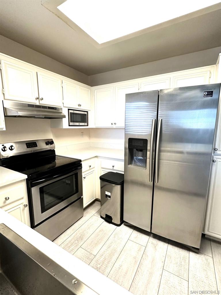 Seller is Motivated. Newly Upgraded! New luxury Vinyl flooring, New carpet, New toilets, Brand New quartz counter top/stainless sink, New washer/dryer in unit laundry . Charming 2bed/2bath condo nestled in The Summit at 4S Ranch offers a bright and airy living room that opens up to a private balcony with mountain view, stainless steel appliances in the kitchen. The spacious primary bedroom boasts a large closet. The second bedroom is equally spacious and can serve as a guest room, home office. Residents of The Summit enjoy access to a host of amenities, including two sparkling swimming pools, rejuvenating spas, tennis courts, a well-equipped fitness center, and beautifully landscaped common areas. This home offers easy access to shopping, dining, and entertainment options, as well as major freeways for a smooth commute and Poway school district.