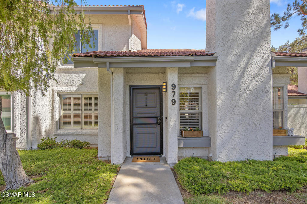 Welcome to this beautifully updated Oak Park townhome offering 3 bedrooms and 3 bathrooms with just one shared wall. Light updated floors flow throughout the main living areas, creating a warm and inviting atmosphere. The living room boasts soaring ceilings, a cozy fireplace, and abundant natural light, while the adjacent dining area opens to a private patio--perfect for indoor-outdoor living.The updated kitchen features sleek quartz countertops, stainless steel appliances, and a convenient laundry room nearby. Upstairs, the spacious primary suite is a peaceful retreat with a newly remodeled ensuite bathroom and modern closet doors. An additional bedroom and bathroom complete the upper level, while a third bedroom and full bath are conveniently located downstairs.Enjoy the community's sparkling pool and spa, plus the convenience of a two-car garage. Ideally situated near parks, top-rated Oak Park schools, and scenic hiking trails, this home combines comfort, style, and location.