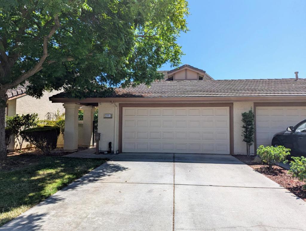 Spacious, light and bright home in active senior community - 1 person must be 55+. Soaring ceilings in living room and dining area. Fireplace with gas starter. Remodeled kitchen features quartz counters, custom backsplash and painted cabinets, stainless steel appliances, electric range, and cheery breakfast nook. Vinyl plank flooring throughout the first floor. Front courtyard and back patio; plenty of space for outdoor entertaining. Remodeled Primary bedroom suite features wall to wall closets, dual sinks, large tub for relaxation, and stall shower. Den and laundry room are also downstairs, plus a half bath. Upstairs there is a bonus room for storage plus the second bedroom and bathroom. Perfect for guests or caregiver. Two car garage. Refrigerator included. Submit pet request. Available now. Rent includes Golf Membership (playing golf extra), gated access with 24 hour security, Water/Sewer/Cable TV/Garbage, Community newspaper (also online),18 hole golf course, 4 Swimming Pools, 6 Tennis Courts, 3 Bocce Ball courts, 4 Pickleball Courts, Exercise Facility, two restaurants, Library and a US Post office. There are many clubs and organizations to join, hiking trails, and more!